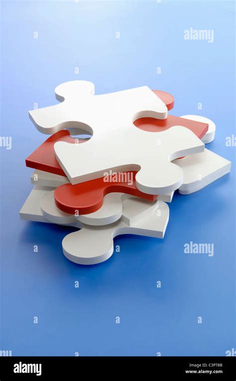 Stacked Puzzle pieces Stock Photo - Alamy