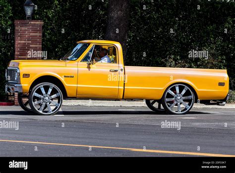 A custom lowered 1969-72 chevy truck with big wheels Stock Photo - Alamy