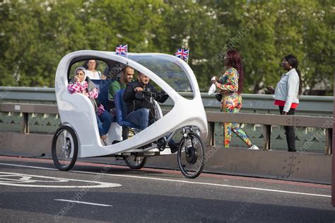 Electric rickshaw bike - Stock Image - C052/2447 - Science Photo Library