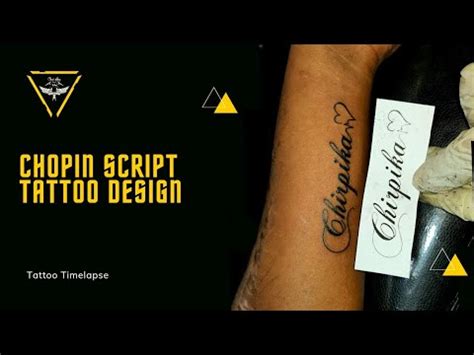 Chopin Script with Small Heartbeat Tattoo Design | Tattoo Name Design | Tattoo Designs for Men ...