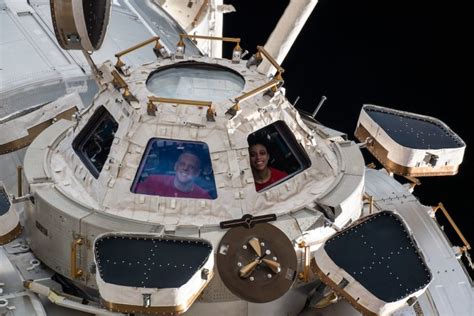 Cool Cupola image looks in at astronauts looking out | Digital Trends