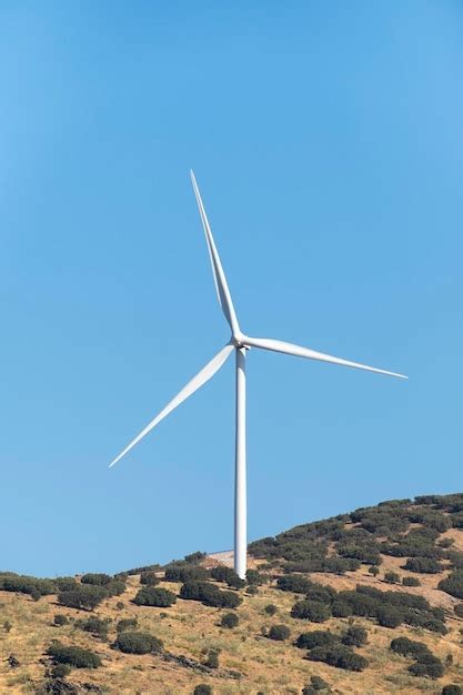 Premium Photo | Wind turbine farm power generator in nature landscape