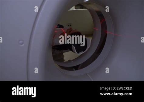 Scan by computed tomograph with red laser beams. CT of the paranasal sinuses for examining the ...