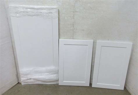 (3) Hampton Bay cabinet doors, One- 25 1/2" x 17 1/2" and Two- 22 1/2" x 14 1/2", unused ...