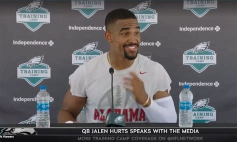 Jalen Hurts sports an Alabama football shirt at Eagles press conference