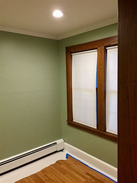 Walls painted with Sherwin Williams Ovation Clary Sage. Stained window ...