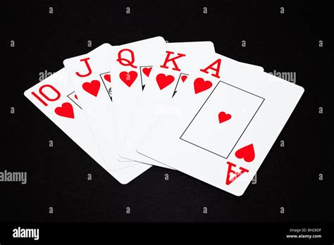 Playing cards showing a Royal Flush poker hand Stock Photo - Alamy