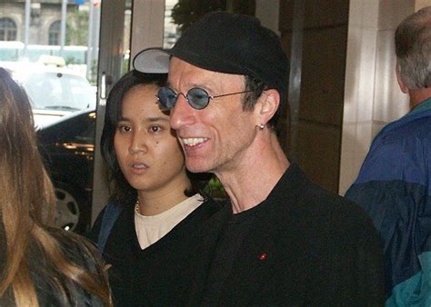 Captured: This picture of Robin and his mistress Claire Yang was taken by a Bee Gees fan at the ...