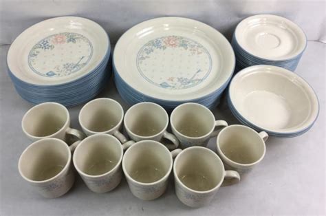 Lot - (56) Corelle Corningware Symphony Pattern Dishes