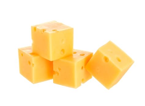 Premium Photo | Cubes of cheese isolated on white