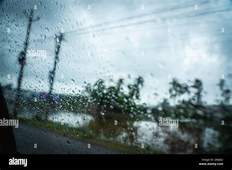 Rain drops on a window glass Stock Photo - Alamy