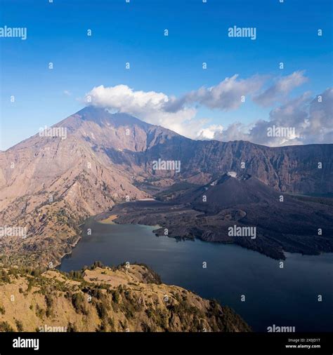 Trekking up the 3726 meter high volcano Gunung Rinjani in Mount Rinjani National Park, Lombok ...