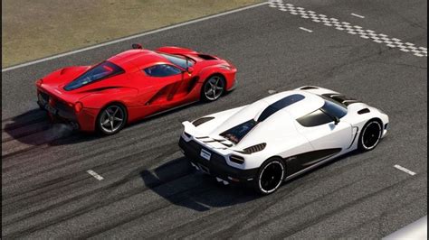 two red and white sports cars driving on a race track