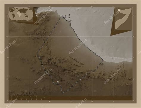 Awdal, region of Somalia. Elevation map colored in sepia tones with lakes and rivers. Corner ...