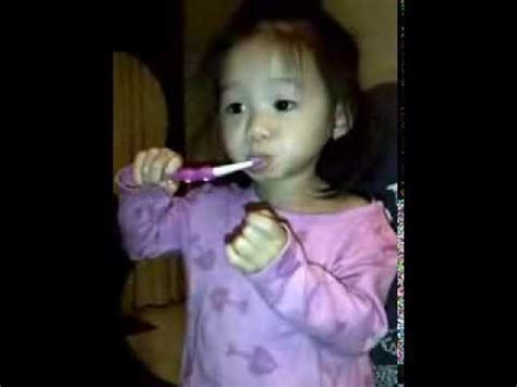 Baby Brushing teeth along with Elmo's song - YouTube