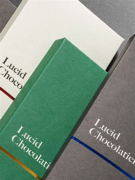 Lucid Chocolatier Clean Chocolate Packaging Design in 2023 | Chocolate packaging design, Graphic ...