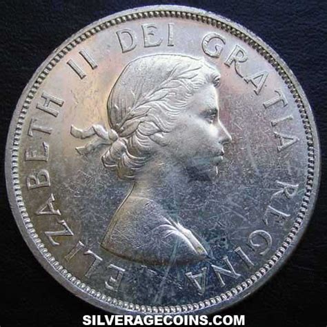 1958 Elizabeth II Canadian Silver Dollar (British Columbia) - Silveragecoins