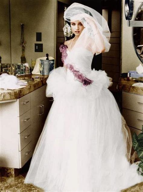 amomadonna: Madonna wearing her wedding dress 16th August 1985 in which she married Sean Penn.