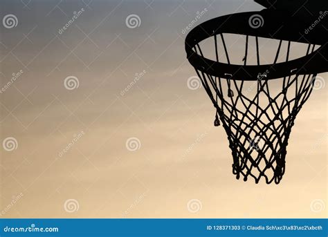 Basketball Hoop Silhouette In The Sunset. Cirrostratus Clouds Ba Stock ...