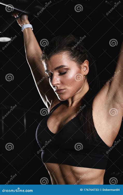 Athletic Young Woman Doing Triceps Exercises on a Terrier in the Gym. Sports Motivator, Sport ...