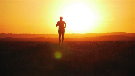 Silhouette Of Runner In Beautiful Sunset Stock Footage SBV-338726979 - Storyblocks