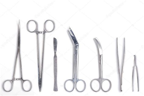 Surgeon tools - scalpel, forceps, clamps Stock Photo by ©DmitryRukhlenko 1083282