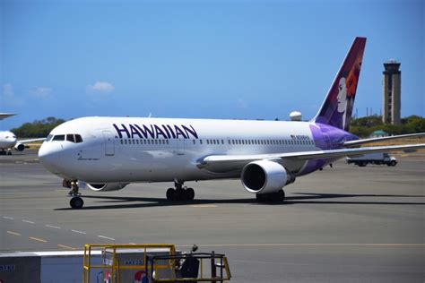 Hawaiian Airlines is Weighing Passengers at Check-In For One of Their ...