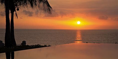 Infinity Pool At Sunset Photograph by Andrea Urlass - Pixels