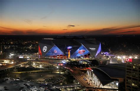 A deluge of drones fly over Super Bowl stadium, despite ban