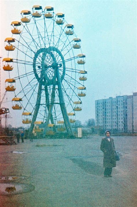 Unknown woman stands in front of an Amusement park, Pripyat, April 27th ...