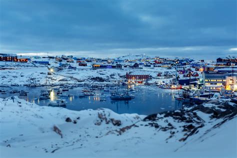 Overview of the Ilulissat harbour during the blue hour in Greenland. By Rebecca Gustafsson