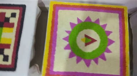 Rangoli by colored Rice - YouTube