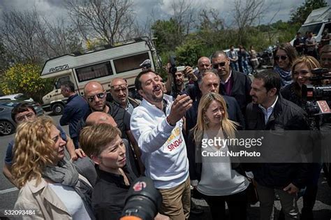 14 Giorgia Meloni And Matteo Salvini Visit A Nomad Camp Stock Photos ...