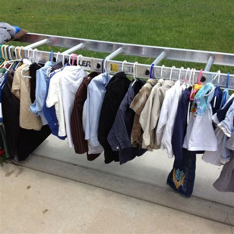 Great idea for displaying clothes at a garage sale in Portage, IN | Garage sale clothes, Garage ...