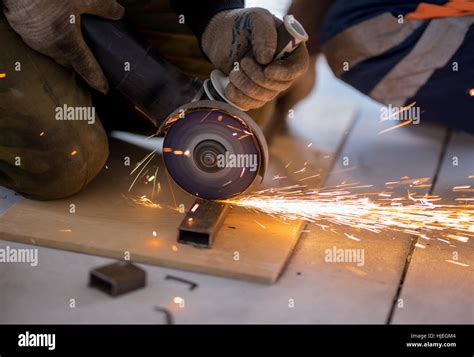 Cutting metal with angle grinder Stock Photo - Alamy