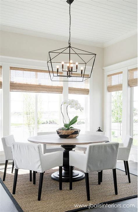 Modern Farmhouse Dining Room. Simple design approach with a striking ...