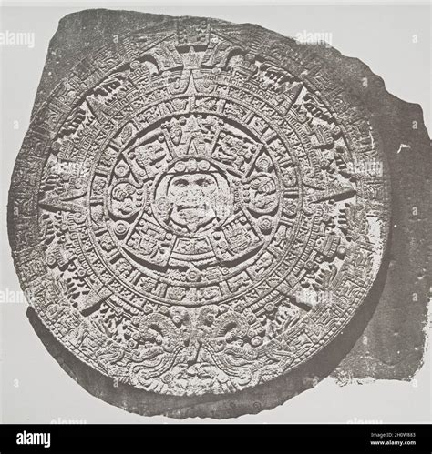 The ancient Aztec calendar or Sun Stone. Photograph by French archaeologist Désiré Charnay ca ...