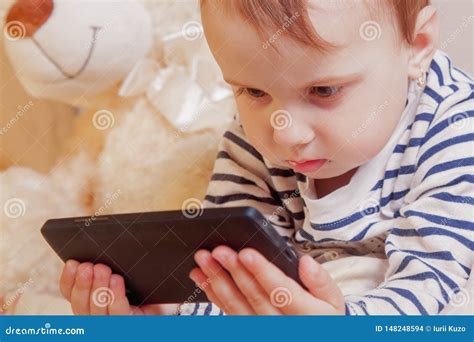 Device Safety and Safest Phones for Kids Concept. Little Cute Child ...