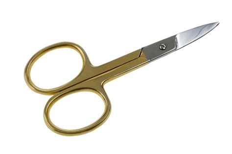 Premium Photo | Gold scissors