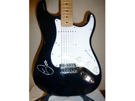 Eric Clapton Signed Guitar at Chicago 2013 as J30 - Mecum Auctions