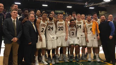 UVM men's basketball team sweeps America East awards