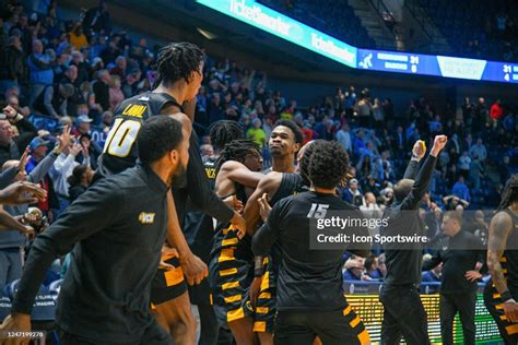 VCU Rams players celebrate around VCU Rams guard Zeb Jackson after he... News Photo - Getty Images