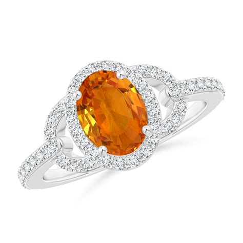 Vintage Style Oval Orange Sapphire Halo Ring | Angara