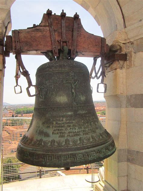 The bells atop the leaning Tower of Pisa... | Leaning tower of pisa, World heritage sites, Pisa