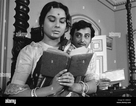 SOUMITRA CHATTERJEE and MADHABI MUKHERJEE in CHARULATA (1964), directed ...