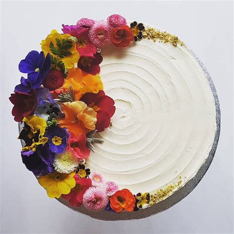 Edible flowers arranged into a crescent moon | Wedding cakes with flowers, Fresh cake, Floral cake