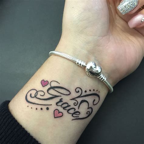 Grace. Tattoo. Wrist. Daughter. | Wrist tattoos for women, Tattoos for daughters, Name tattoos ...