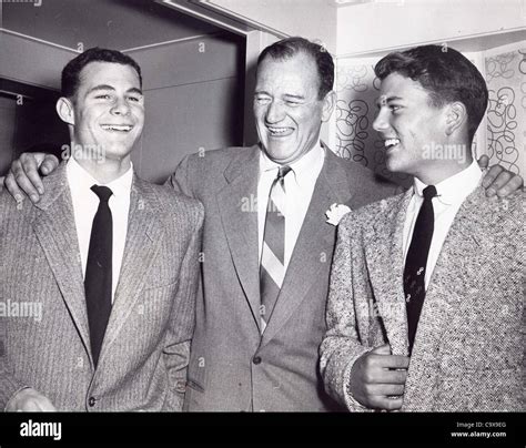 JOHN WAYNE with his sons Michael Wayne and Patrick Wayne.Supplied by ...