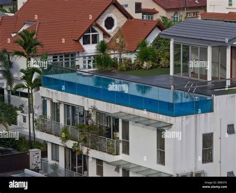 Luxury house with rooftop swimming pool in wealthy district of Singapore Stock Photo - Alamy