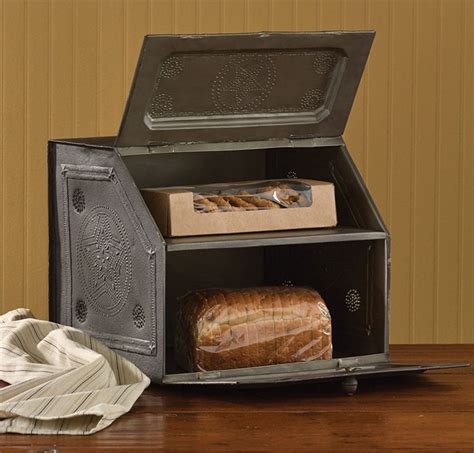 This antique tin breadbox, will give your kitchen a rustic feel. It is ...